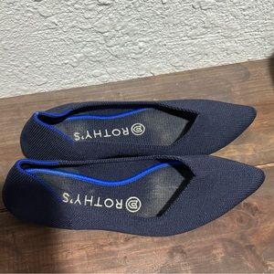 Rothy’s dark blue shoes